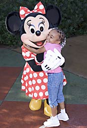 "Disneyland is always fun and full of hugs with Minnie Mouse"